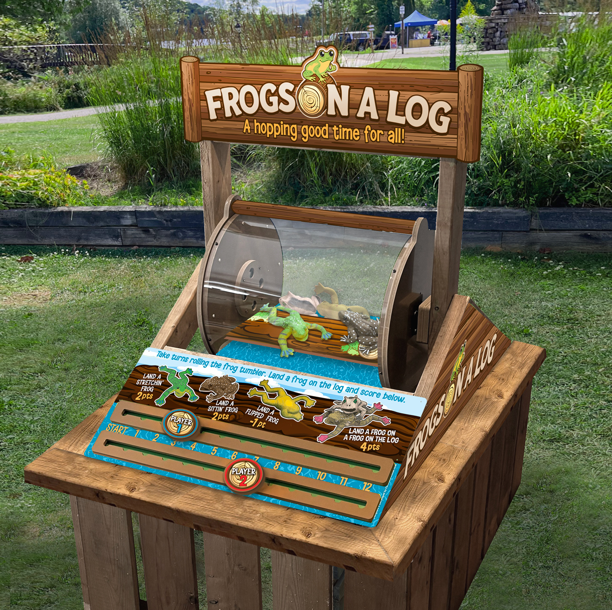 Wooden game machine titled 'Frogs on a Log' in an outdoor setting.